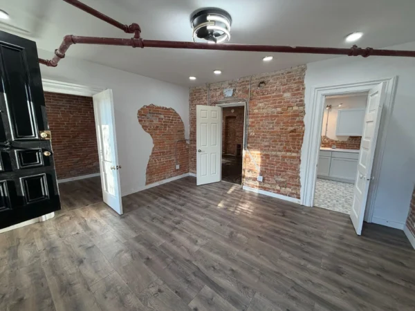 N 2nd Rockford, IL project: Finished bedroom luxury vinyl plank industrial apartment