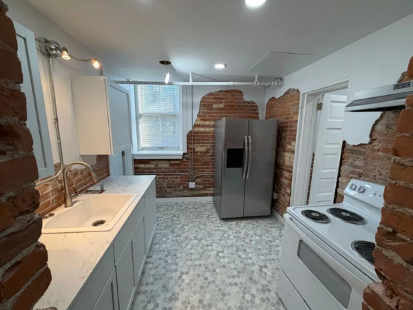 N 2nd Rockford, IL project: Finished kitchen linoleum flooring electric stove cabinets