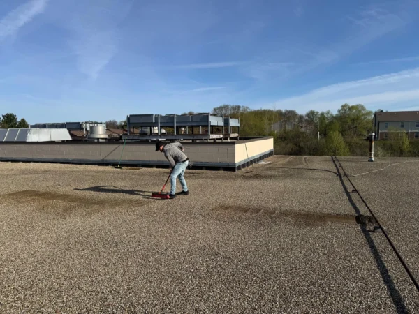 County Market Dixon project: Built-up roof aggregate clearing sweep