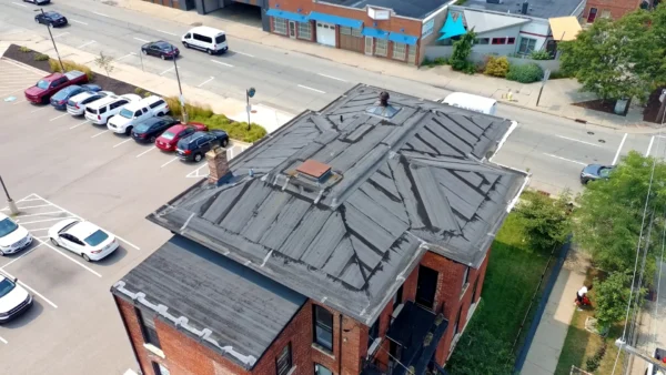 N 2nd Roof project: EPDM roof repair, gutters and tar built-up roofing