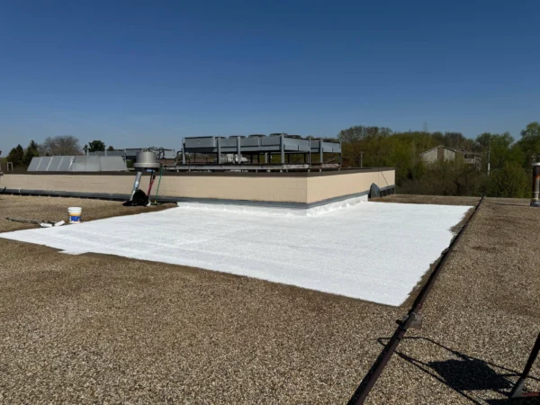 County Market Dixon project: Roof sealant first coat application elastomeric