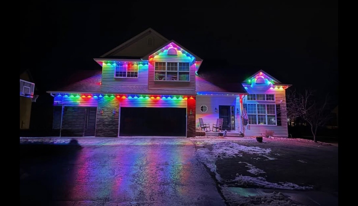 Close-up architectural detail of commercial roofline holiday lighting
